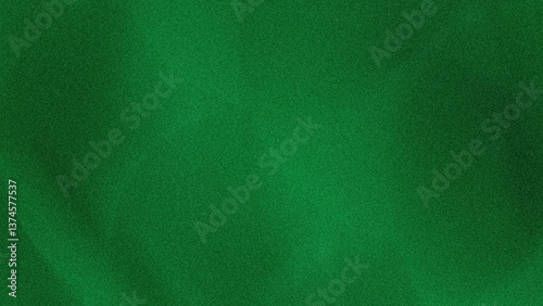 A blurry green background with varying shades of color creating a soft and abstract visual effect seen here