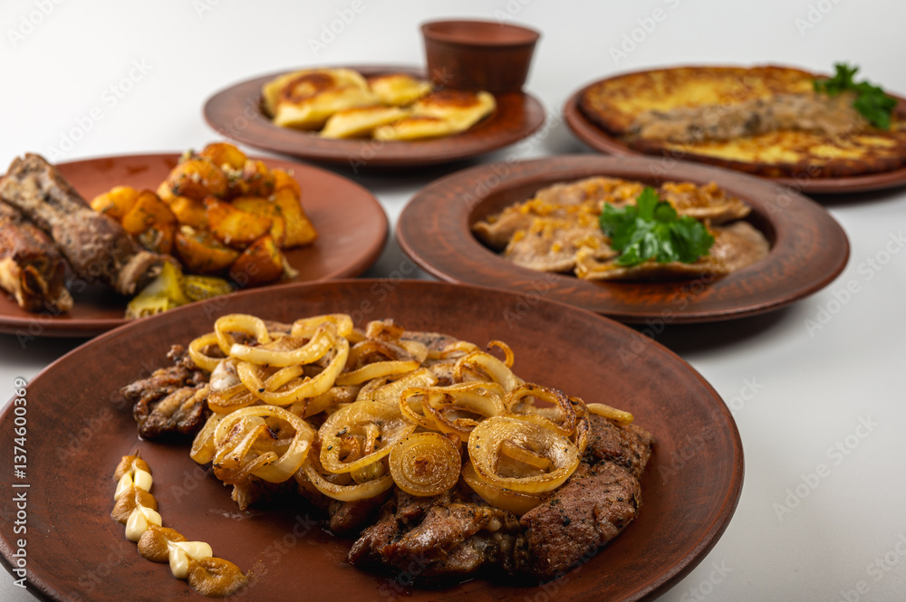 Grilled pork steak with golden fried onions served on a rustic clay plate. Traditional Eastern European dish with mustard, mayonnaise and fresh parsley garnish, on a light background Grilled pork steak with golden fried onions served on a rustic clay plate. Traditional Eastern European dish with mustard, mayonnaise and fresh parsley garnish, on a light background