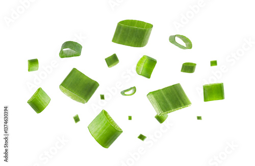 Chopped green onion. Fresh slices flying on white background