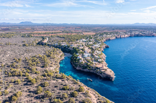 Obraz na płótnie Aerial view of Cala Pi, Majorca, showcasing the coastline and turquoise waters w salonie