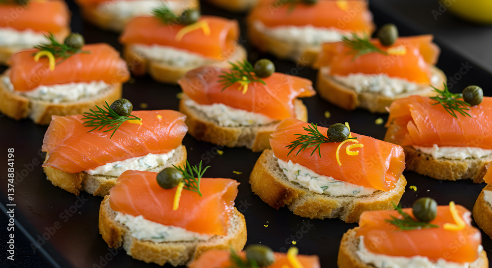 Elegant smoked salmon canap?s arrangement on a dark tray, festive appetizer Elegant smoked salmon canap?s arrangement on a dark tray, festive appetizer