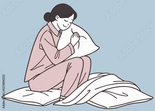 Asian woman in pink pajamas hugs a soft white pillow while sitting on a bed under a white blanket, smiling gently against a plain blue background, expressing comfort and warmth.