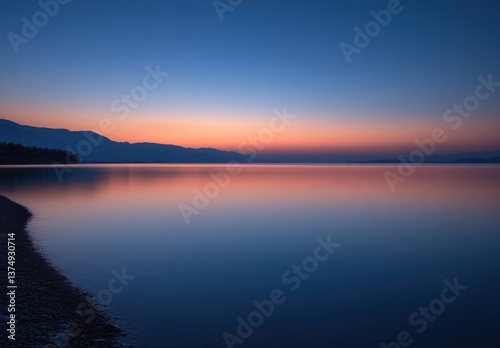 Serene Sunrise Over a Calm Lake