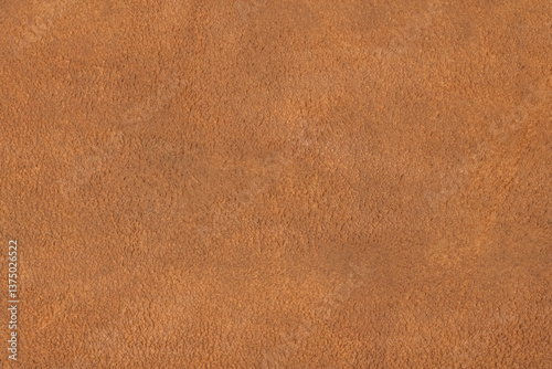 Natural light brown suede texture. Genuine shammy-leather with slight shabby texture, pattern or background, close-up, high resolution.