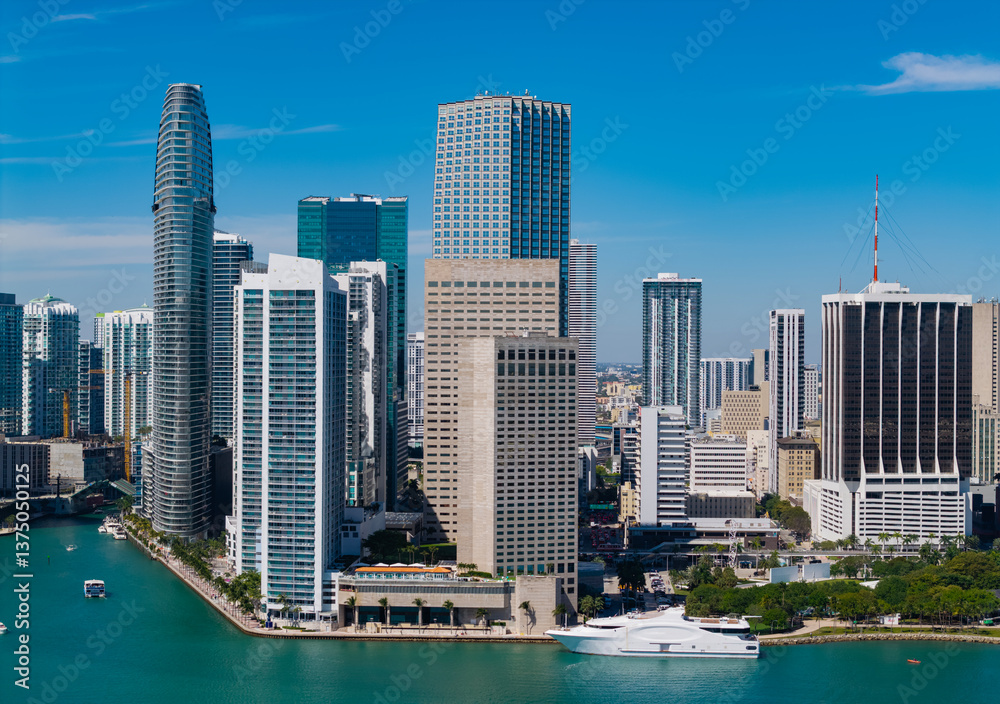 Fototapeta premium Miami skyline. Miami skyscraper cityscape. Miami city skyline view of Brickell key. Miami downtown. Skyscraper building. Cityscape building downtown. Travel destination. City architecture