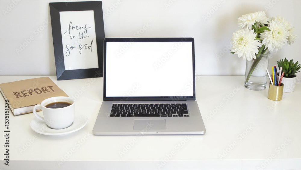 Stylish workspace with laptop, modern desk setup featuring coffee cup, framed art, and fresh flowers, ideal for productivity. Isolated on white background or PNG Stylish workspace with laptop, modern desk setup featuring coffee cup, framed art, and fresh flowers, ideal for productivity. Isolated on white background or PNG