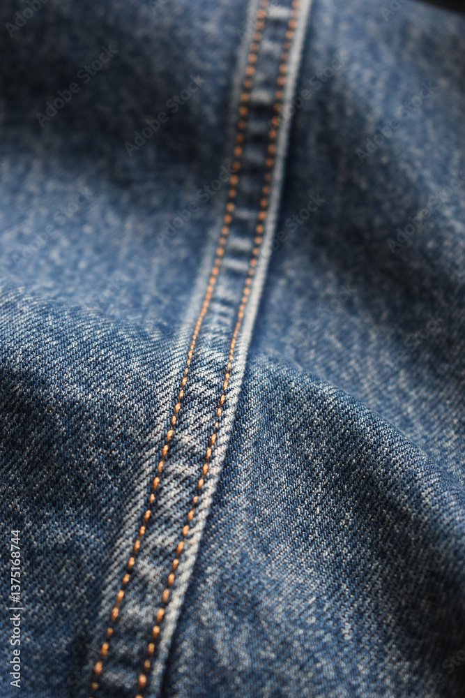 Fototapeta premium seam of blue denim texture background, jean fashion style