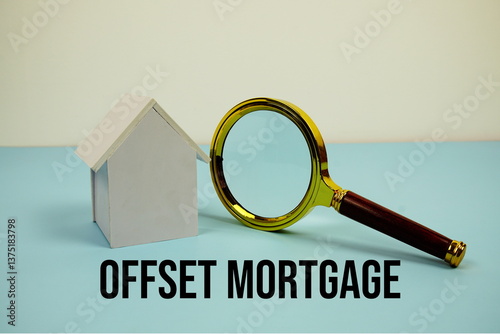 Offset Mortgage text with White Model House and magnifying glass on blue background
