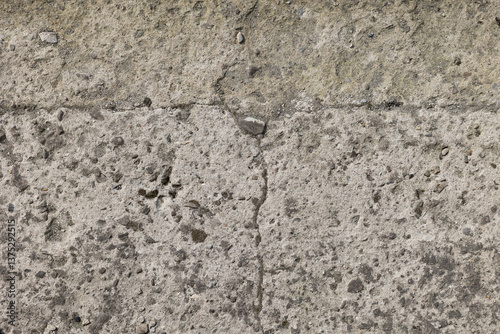 Background of destroyed concrete path, gray concrete, concrete texture, close-up. Natural photo. Old concrete slab