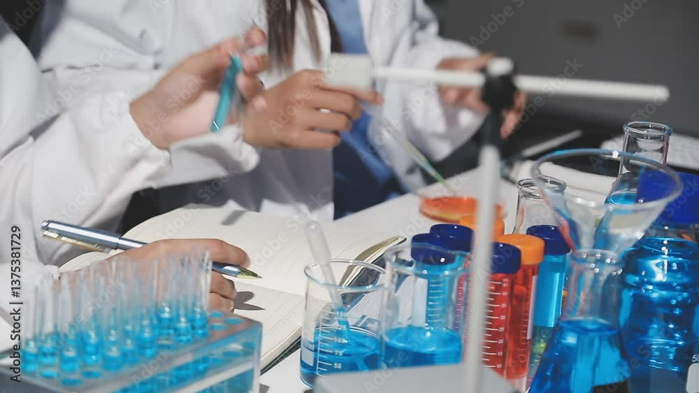 Scientist analyze biochemical samples in advanced scientific laboratory. Medical professional use microscope look microbiological developmental of viral. Biotechnology research in science lab. Scientist analyze biochemical samples in advanced scientific laboratory. Medical professional use microscope look microbiological developmental of viral. Biotechnology research in science lab.
