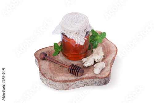 Organic Honey Jar with Fresh Ginger, Mint Leaves, and Wooden Honey Dipper on Rustic Wooden Board – A Natural Remedy for Health and Wellness