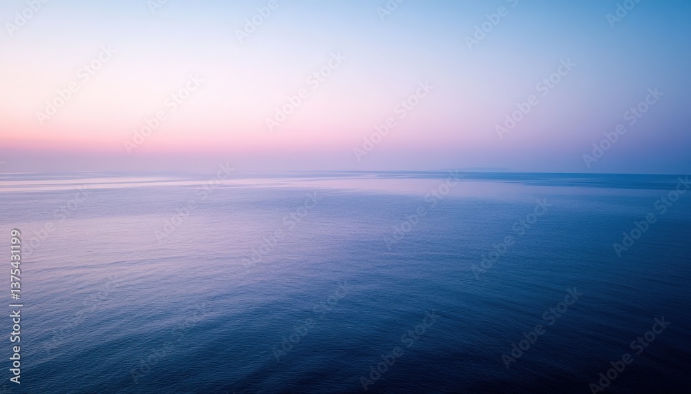 Obraz premium Peaceful Sunrise Over the Calm Sea