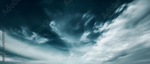 Fototapeta Naklejka Na Ścianę i Meble -  Captivating nighttime sky with swirling distorted clouds created by long exposure or photographic filter resulting in a contemporary cinematic lighting effect