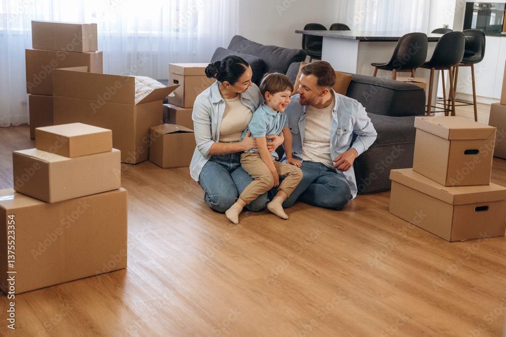 Finally some rest. Family of husband, wife and son are moving into new house