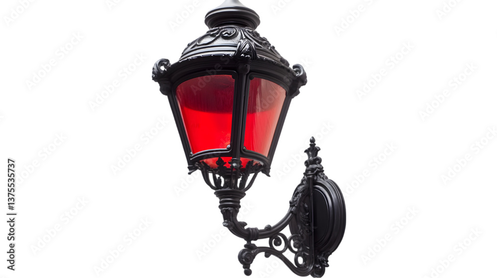 Close up of an ornate black metal lamp with a red glass shade against a dark background Close up of an ornate black metal lamp with a red glass shade against a dark background