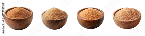Closeup of four wooden bowls filled with various types of unrefined brown sugar including raw cane sugar and turbinado sugar arranged on a plain background