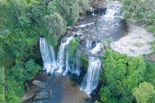 Cambodia, Phnom Kulen, beautiful waterfall is in the middle of a lush green forest