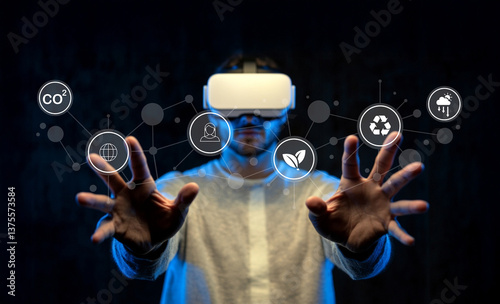 Person Using Virtual Reality Headset with Interactive Icons Representing Sustainability, Environment, Technology, and Connectivity Concepts