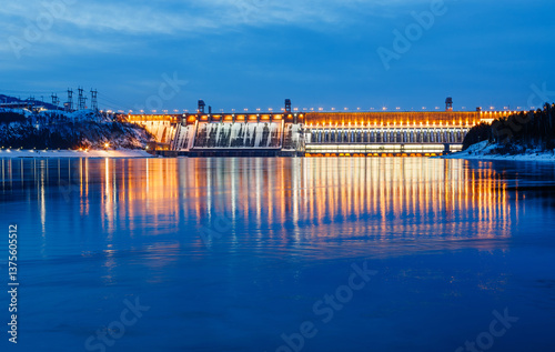View of a hydroelectric dam on a river, long exposure photography at dusk