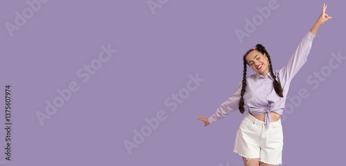 Happy woman with braids on ...