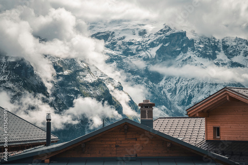 Panoramic view of the Swiss mountain landscape taken from the village of Mürren, in the Jungfrau region, Interlaken, Switzerland. photo