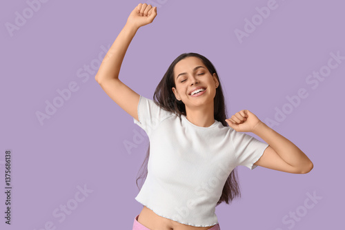 Cheerful young woman on lil...