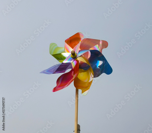 colorful plastic windmill toy rotating in the wind