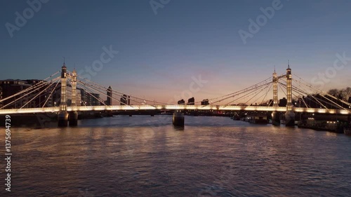 Albert Bridge and Thames River aerial shot at dusk in London