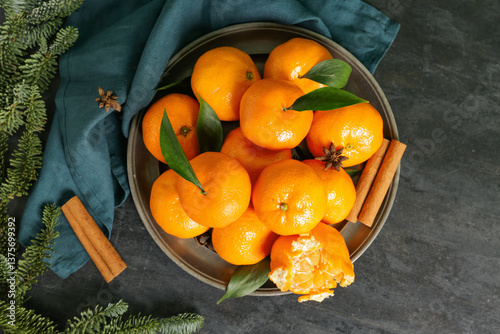 Plate of sweet mandarins wi...