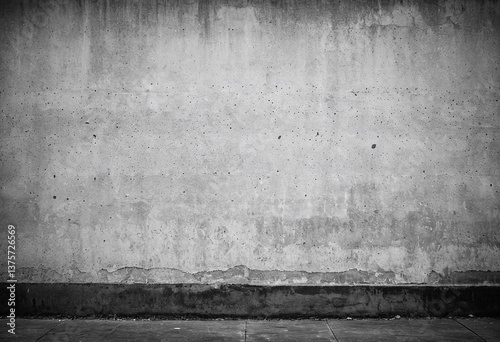 A black and white photo of a concrete wall.