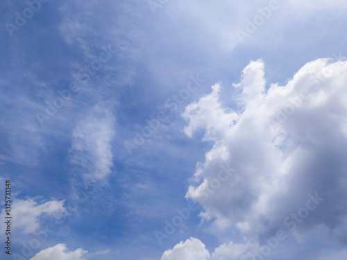 Bright Blue Sky with Moving White Clouds