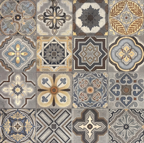 Colonial heritage tiles in random classic geometric floral, star, and ornamental patterns. Handmade colonial tiles, or old heritage tiles in colorful blue and grey vintage paint. Seamless texture.