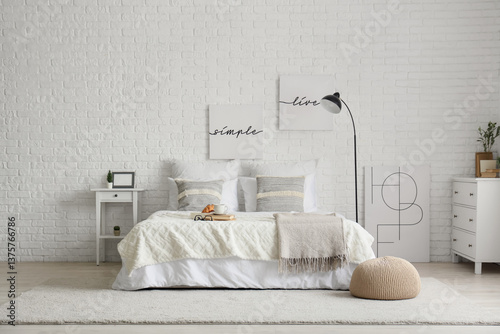 Interior of light bedroom w...