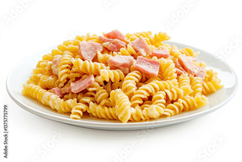 white plate with pasta, spiral-shaped pasta stacked on a beautiful flat white plate with smooth 