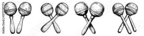 Traditional wooden maracas displayed in pairs, showcasing intricate designs and craftsmanship for musical enjoyment