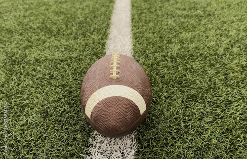 American football on football field background