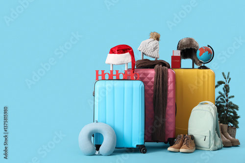 Suitcases with winter and t...