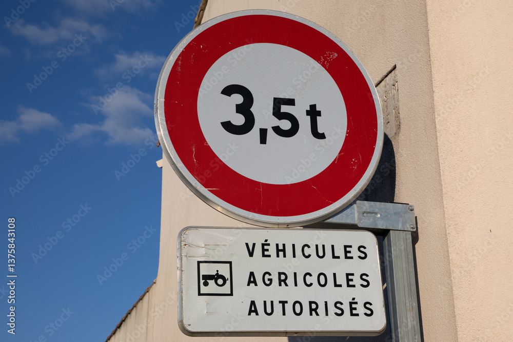 vehicules agricoles autorises french text sign means road sign panel signage heavy goods transport carrier truck more 3,5T prohibited except tractors vehicules agricoles autorises french text sign means road sign panel signage heavy goods transport carrier truck more 3,5T prohibited except tractors