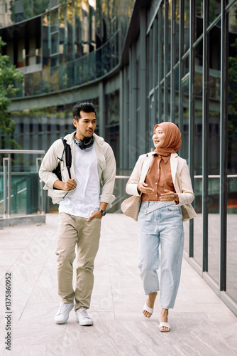 University students walking and talking on campus