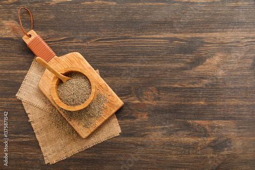 Dried anise seeds in wooden...