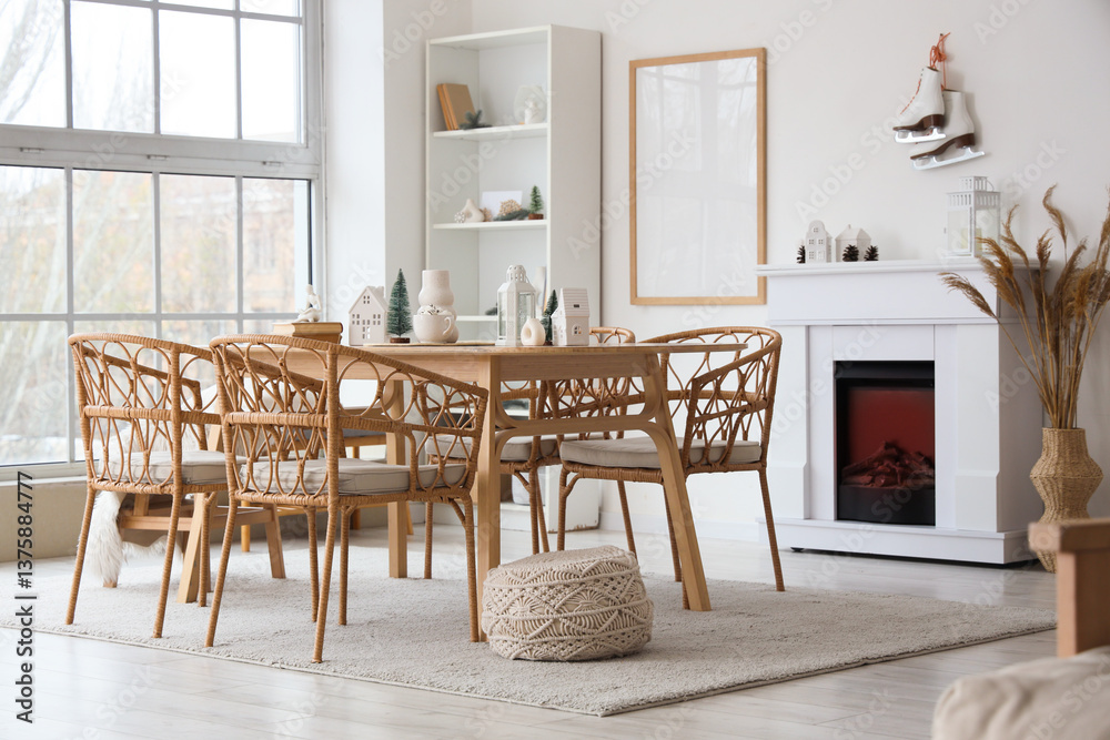Fototapeta premium Light interior of room with dining table, fireplace and winter decor