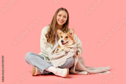 Young woman with Corgi dog ...