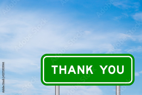 Green color transportation sign with word thank you on blue sky with white cloud background