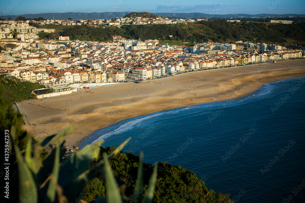 A view from the lighthouse overlooking the city and beach of Nazaré, Portugal.