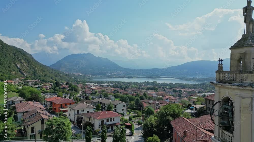 A splendid Catholic Church with Lake Como on the background