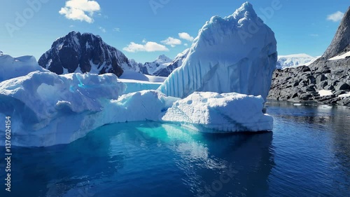 Iceberg scenery landscape scenery Arctic Antarctica beautiful nature winter tourism travel clear blue ice ocean sea water, Glacier melting ice ecology expedition concept. Greenland. Aerial drone view 