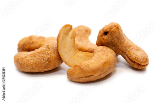 Roasted cashew nuts on white background