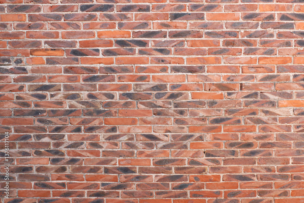 Obraz premium red brick wall at square format as background and texture