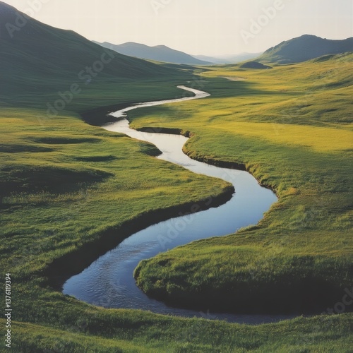 A large grassy plain with a quiet, flowing river cutting through it, the sunlight creating natural reflections on the water s surface, and the grass surrounding the river swaying in the wind
