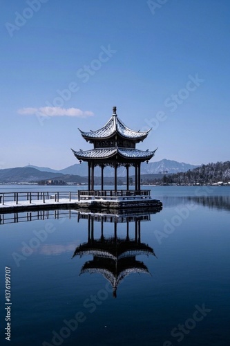 arafed pavilion on a lake with a mountain in the background